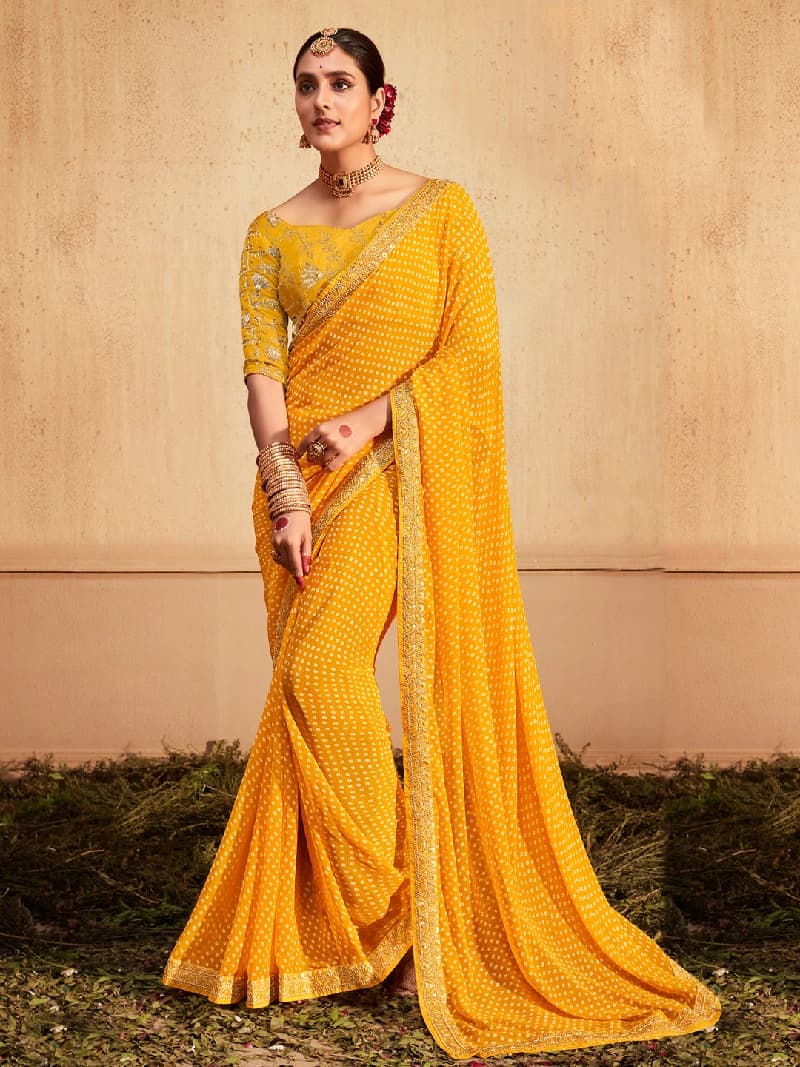 Women's Georgette Yellow Zari Embroidered Designer Saree With Blouse Piece