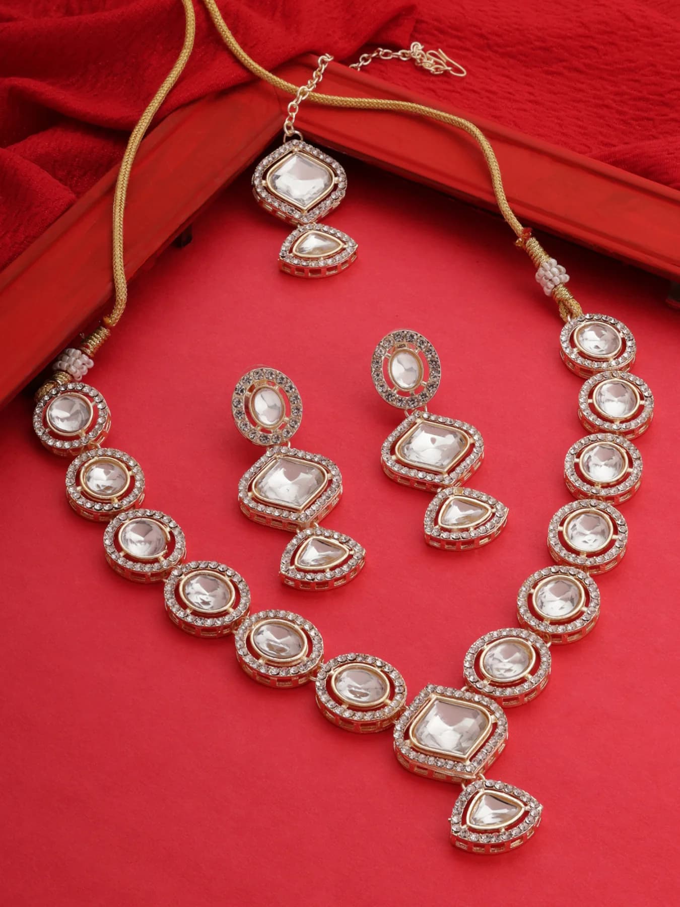 Women's Gold Tone Dazzling Stones Embellished Necklace Earring & Maangtikka Set