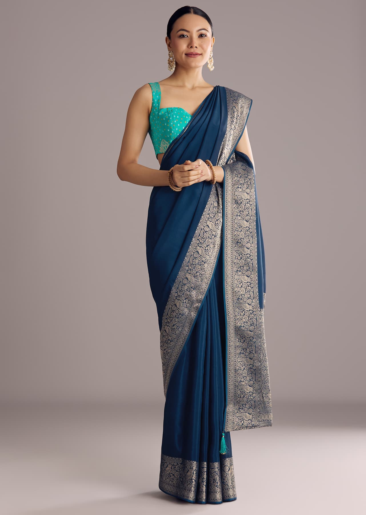 Women's Festive Peacock Blue Dola Silk Saree With Woven Border And Pallu