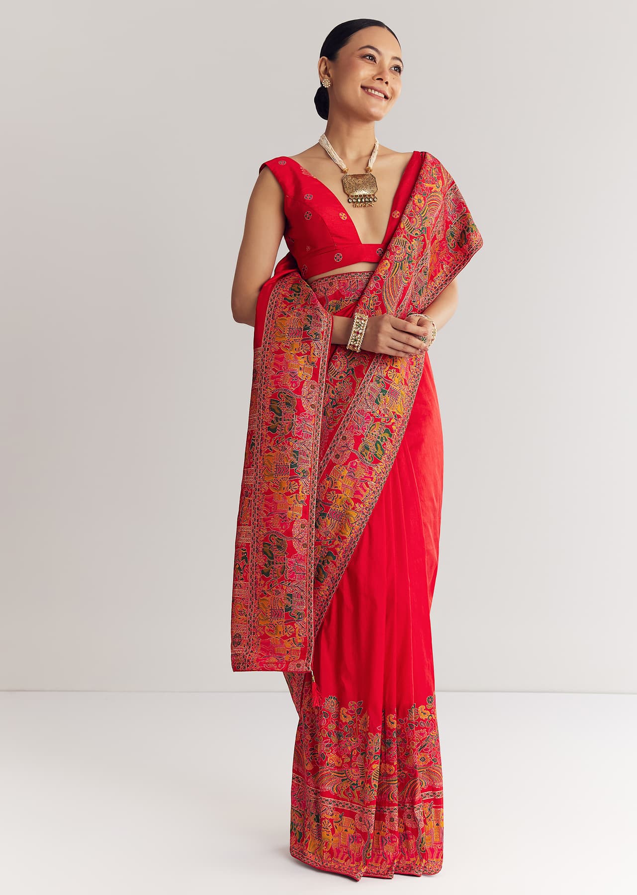 Women's Festive Red Saree With Traditional Floral And Animal Prints