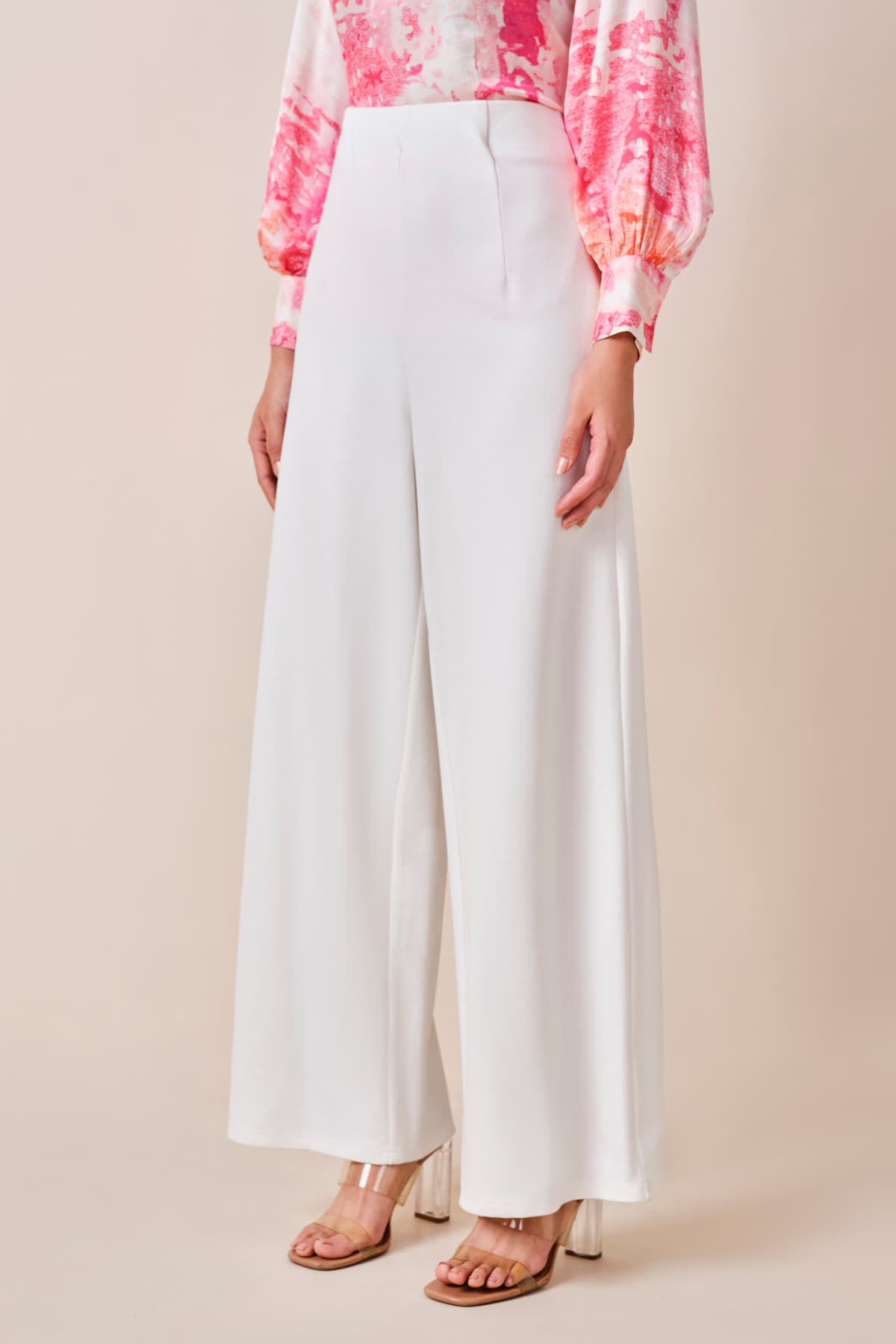 Women's White Casual Solid Flared Fit Trouser