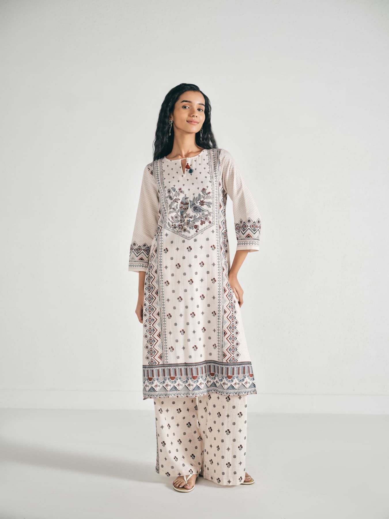 Women's Cream Regular Fit Printed Three Quarter Sleeves Kurta Set