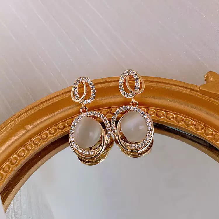 Women's Elegant Gold Pearl Twist Drop Earrings